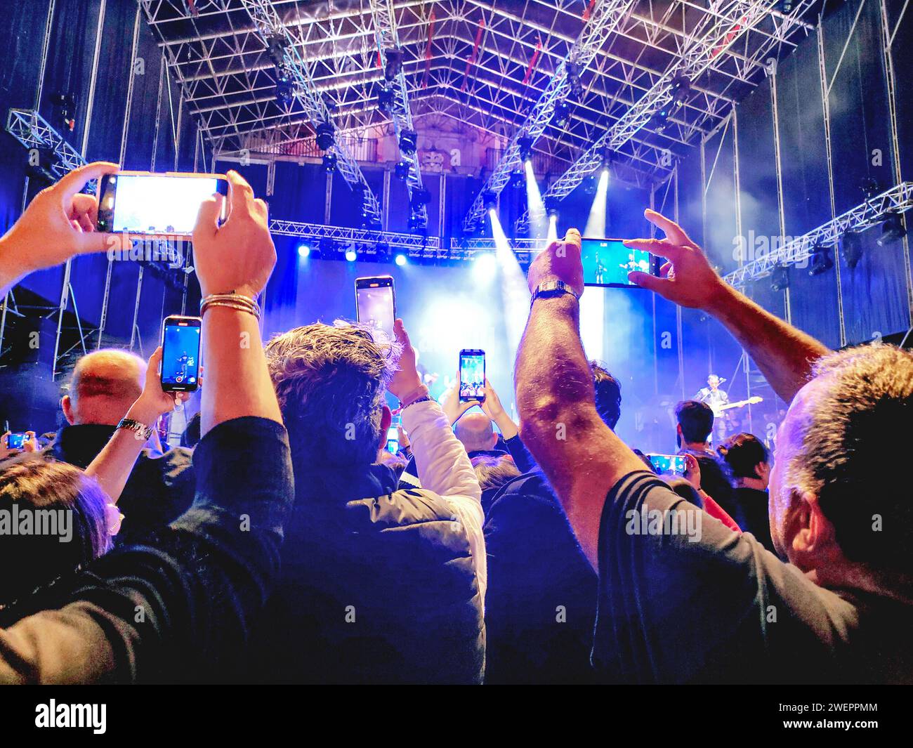 Crowd audience arms air hi-res stock photography and images - Alamy