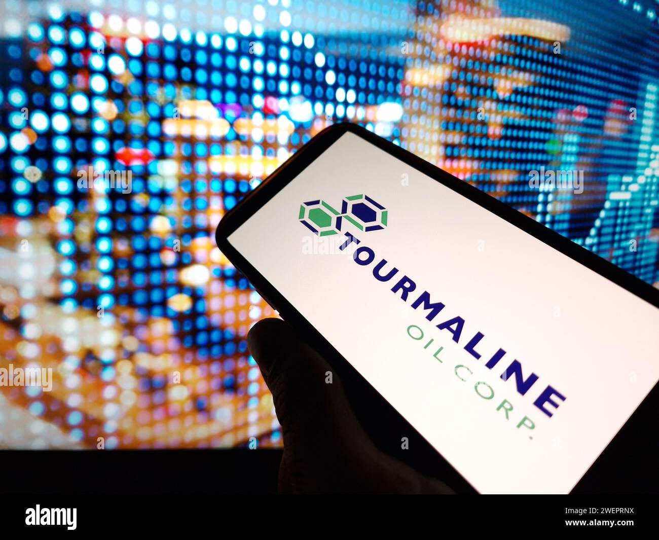 Konskie, Poland - January 25, 2024: Tourmaline Oil company logo displayed on mobile phone screen Stock Photo