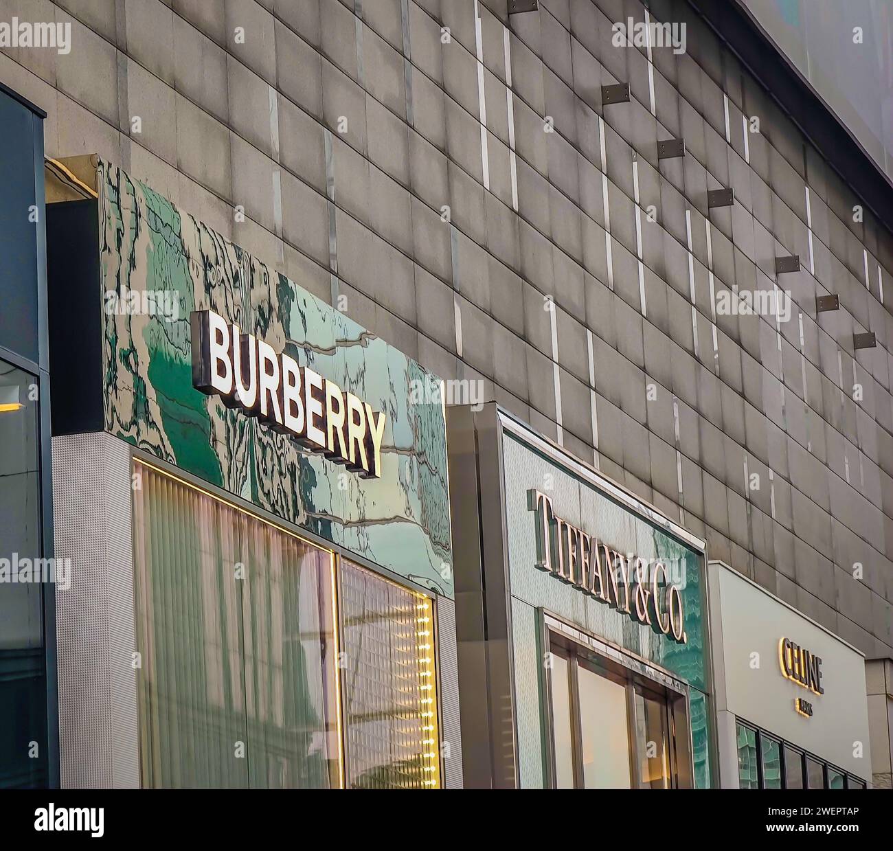 Kuala Lumpur, Malaysia - January 26, 2024: Exterior view of Burberry, Tiffany, Celine stores exterior with company logos in huge luxury shopping mall Stock Photo