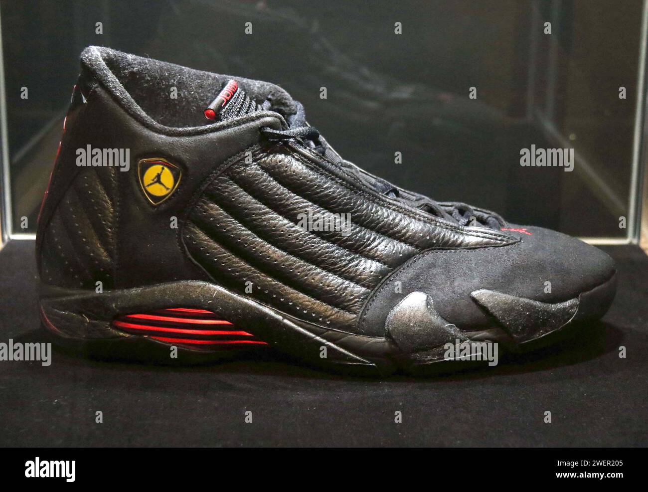 New York, New York, USA. 26th Jan, 2024. Air Jordan XIV (1998) sneaker from ''˜The Dynasty Collection', a set of 6 Michael Jordan ''˜Championship Clinching' Game Worn Air Jordan Sneakers with an estimate of $7 - 10 Million held at Sotheby's New York. The sneakers were giving to Tim Hallam, a public relations executive for the Chicago Bulls who had been with the team since 1978. (Credit Image: © Nancy Kaszerman/ZUMA Press Wire) EDITORIAL USAGE ONLY! Not for Commercial USAGE! Credit: ZUMA Press, Inc./Alamy Live News Stock Photo
