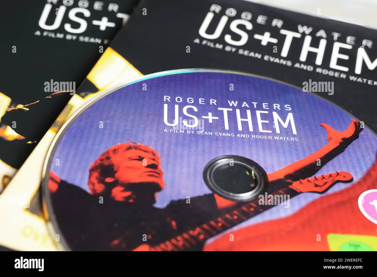 Viersen, Germany - January 9. 2024: Closeup of singer Roger Waters concert movie DVD album cover Us and Them Stock Photo