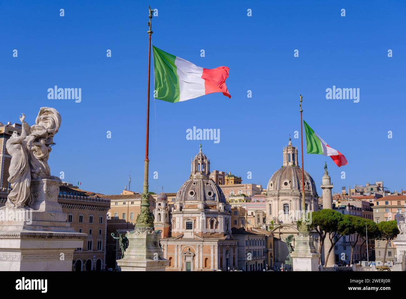Rome, IT - 28 July 2023:  Italy flags at the Monument to Victor Emmanuel II Stock Photo