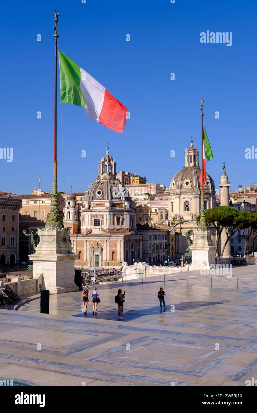 Rome, IT - 28 July 2023:  Italy flags at the Monument to Victor Emmanuel II Stock Photo