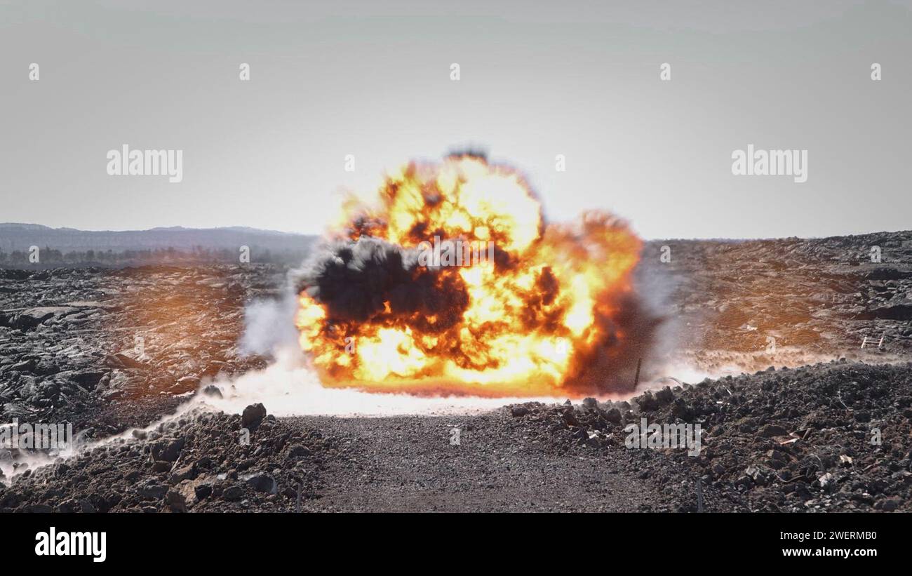 A Bangalore torpedo detonates at a demolition range during exercise Bougainville III at Pohakuloa Training Area, Jan. 24, 2024. Bougainville III is a 3d LCT live-fire exercise focused on decentralized operations to prepare the battalion to command and control forces from dispersed locations. (U.S. Marine Corps photo by Lance Cpl. Clayton Baker) Stock Photo