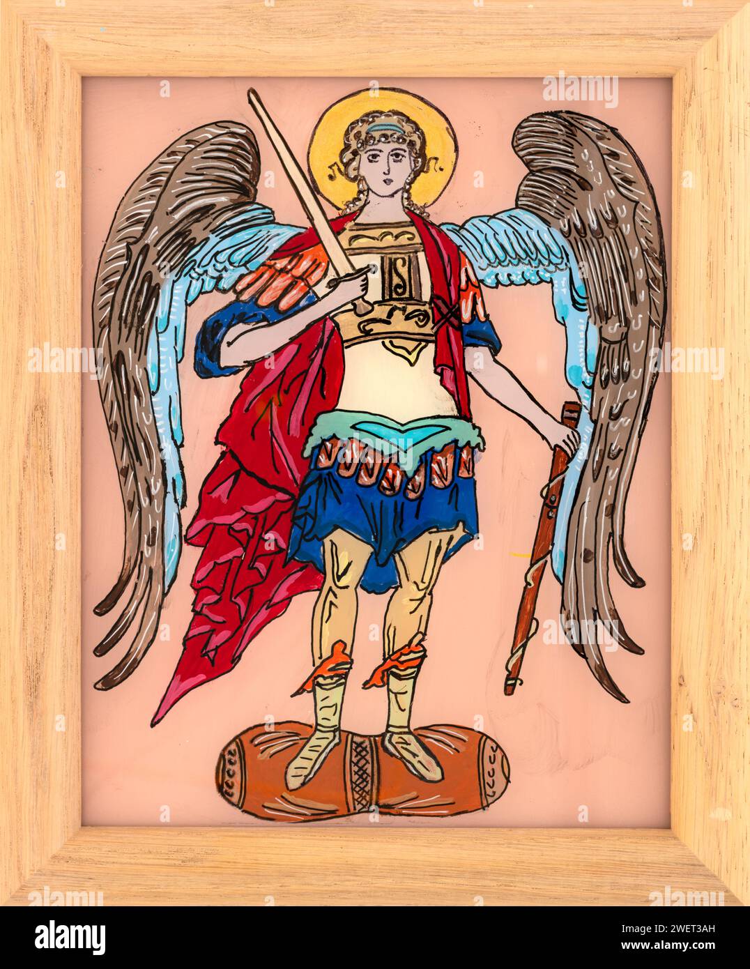 Icon painted on reverse glass in the naive orthodox style of Eastern Europe depicting Archangel Michael. Framed icon. Stock Photo