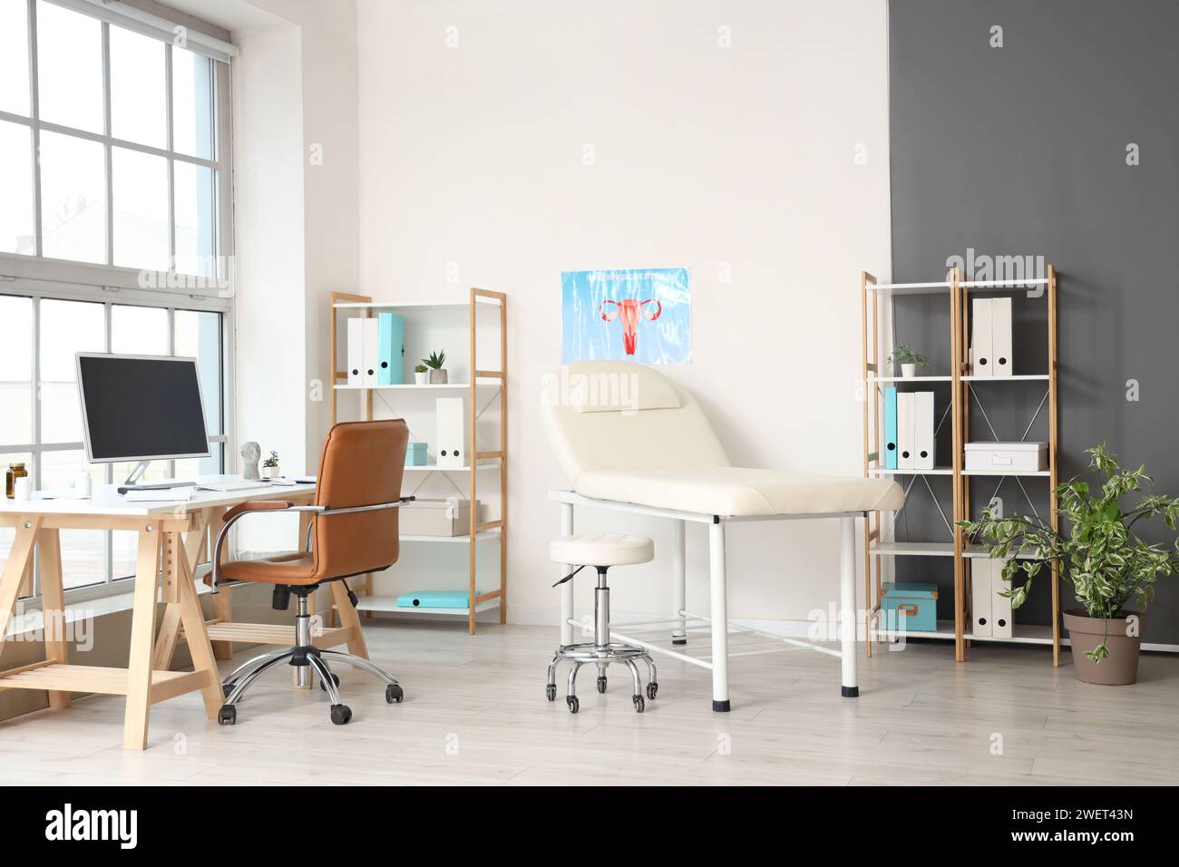Interior of gynecologist's office with workplace and couch Stock Photo ...
