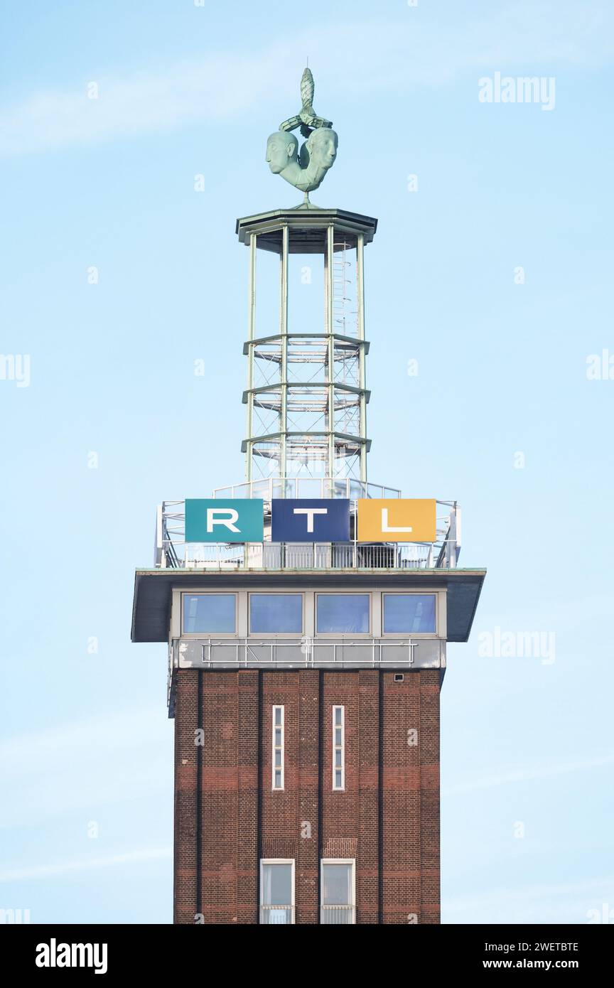 cologne, germany january 20 2024: advertising by private broadcaster rtl on the historic trade fair tower in cologne deutz Stock Photo