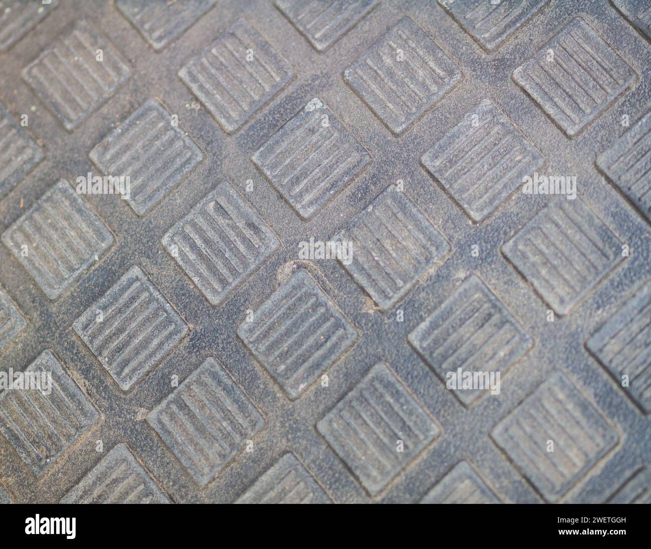 Rough Metallic Diamond Plate Texture on Grunge Industrial Wall Stock Photo