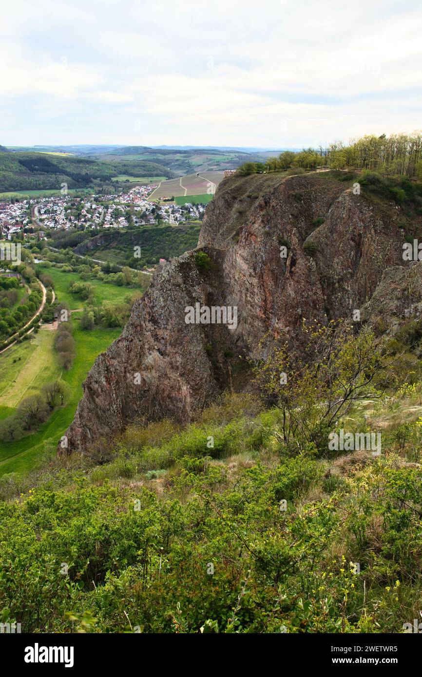 Bad Munster, Germany - May 9, 2021: Rotenfels cliff overlooking a town in Germany on a spring day. Stock Photo