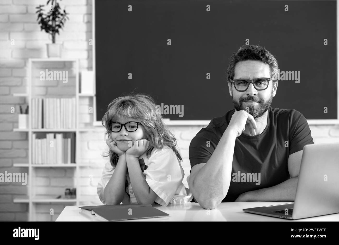 Elementary school student teacher Black and White Stock Photos & Images ...