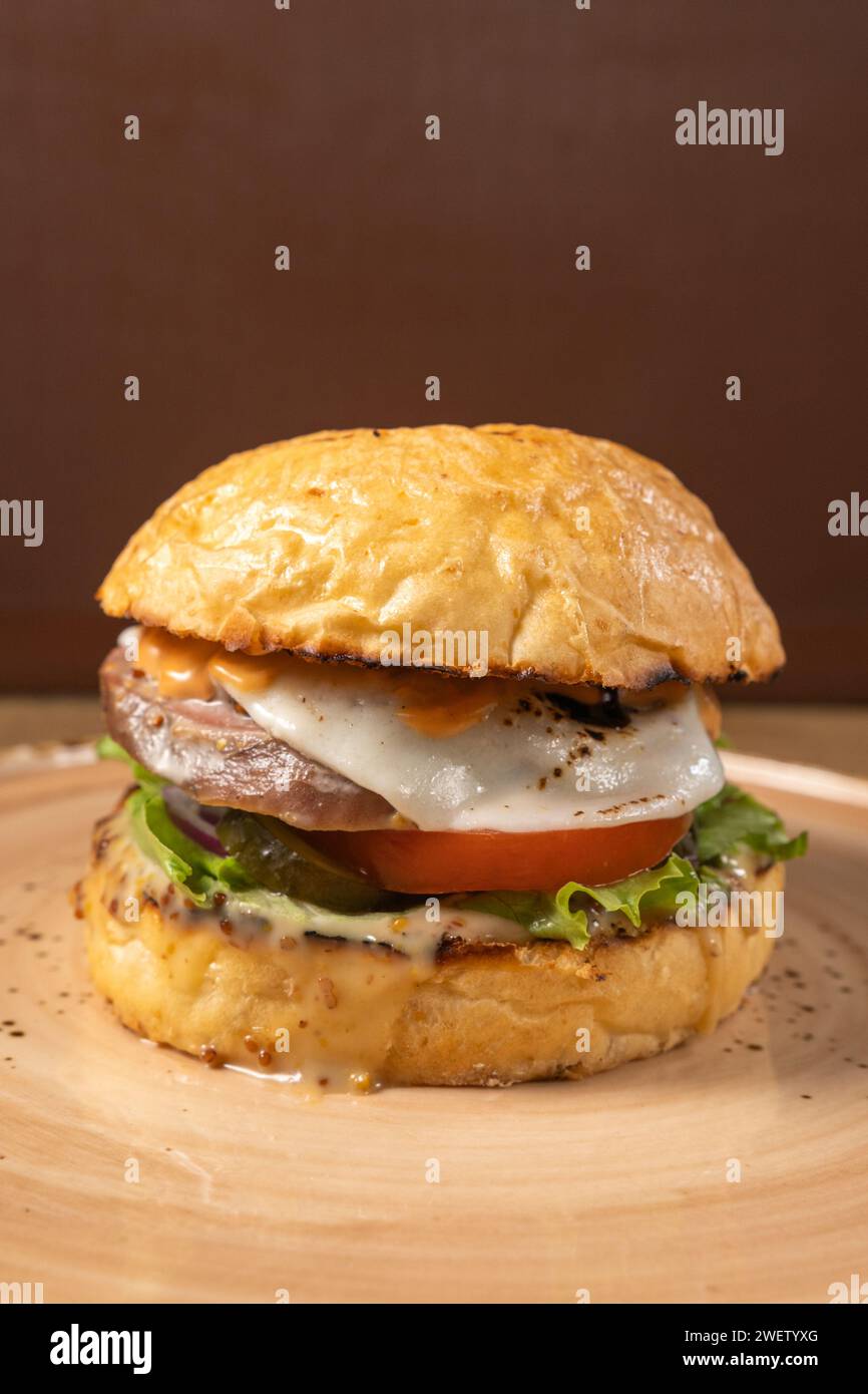 Gastronomic Delight, A Symphony of Savory Flavors in the Perfect burger Masterpiece Stock Photo