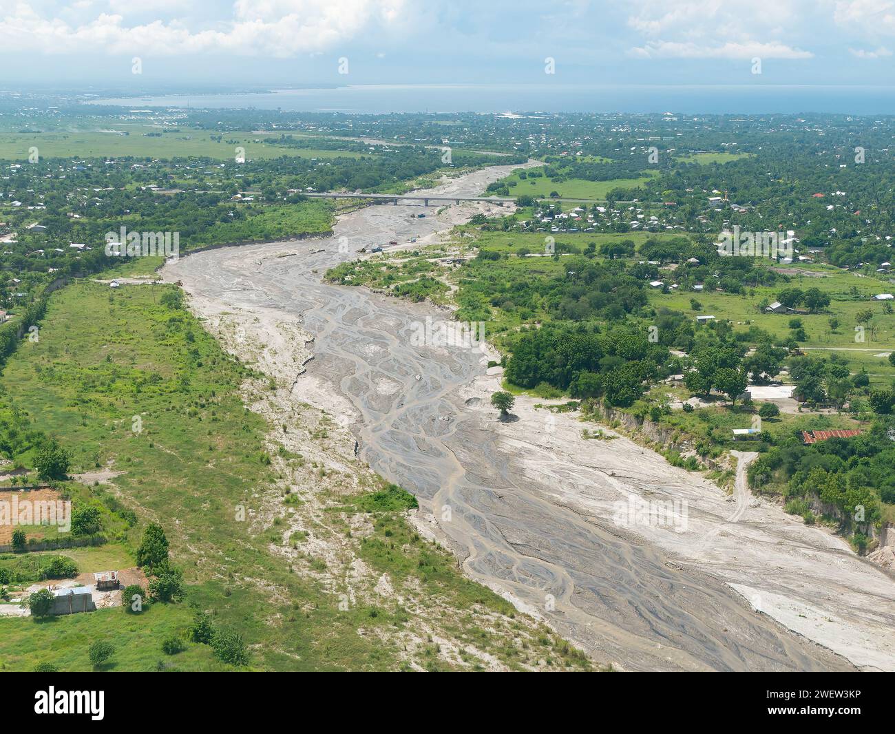 The dried out river bed of Makar River near General Santos City, South Cotabato Province, Soccsksargen Region, Mindanao, Philippines. Stock Photo