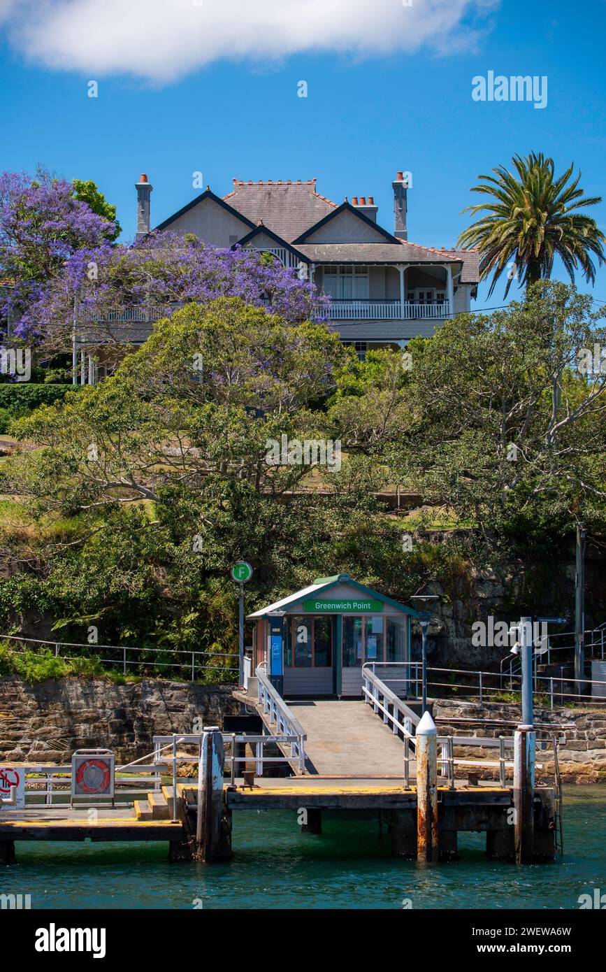 Considered the grandest home on Greenwich Point and sitting above the ferry wharf, 18 Mitchell Street commands 180 degree views of Sydney Harbour Stock Photo