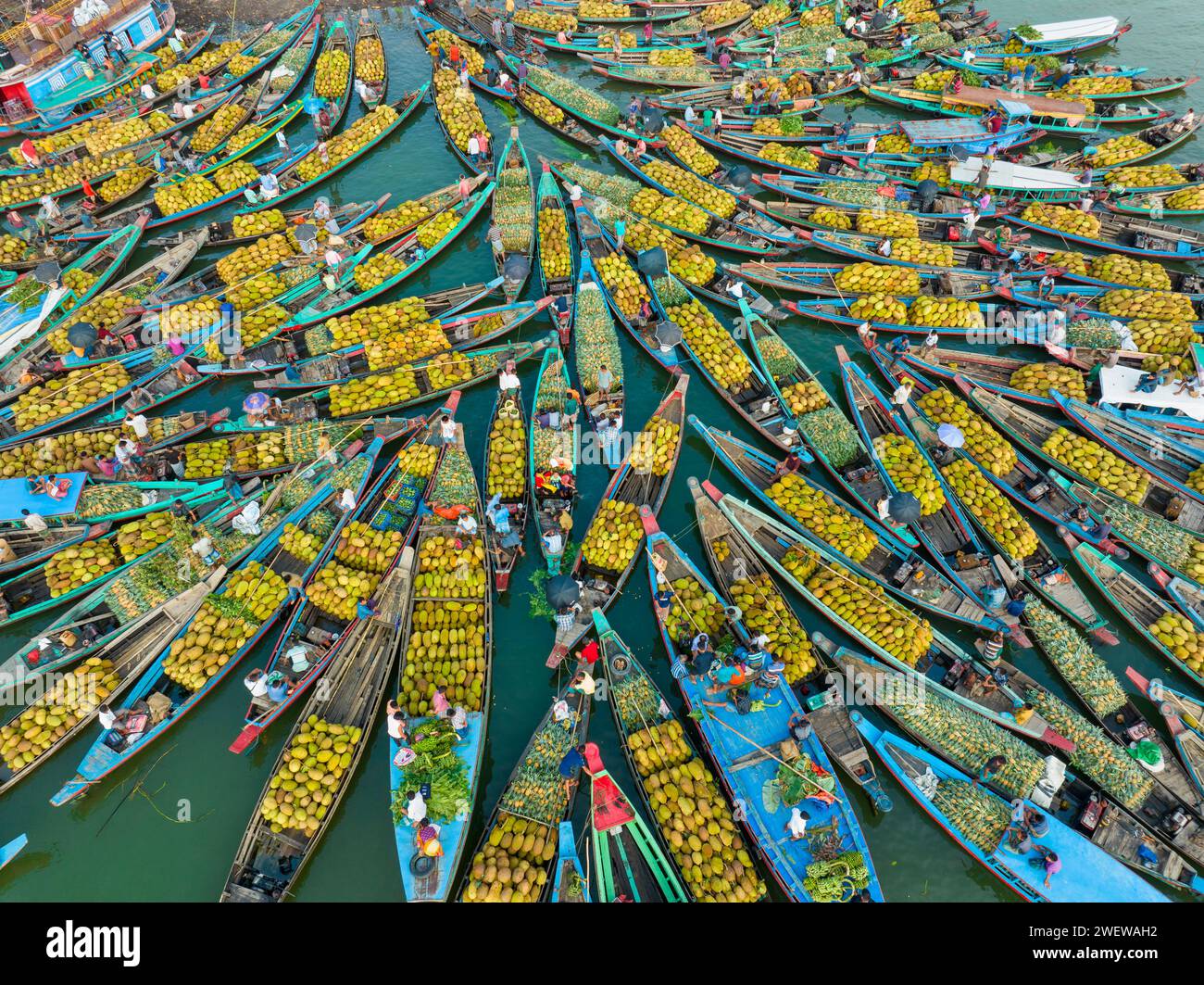 Aerial view of floating market of seasonal fruits on the boats in ...