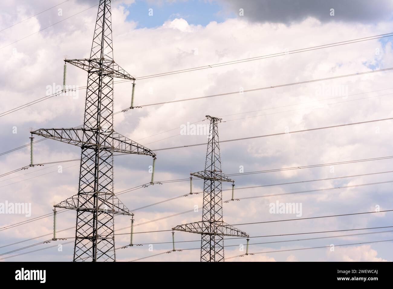 High voltage towers with sky background. Power line support with wires ...