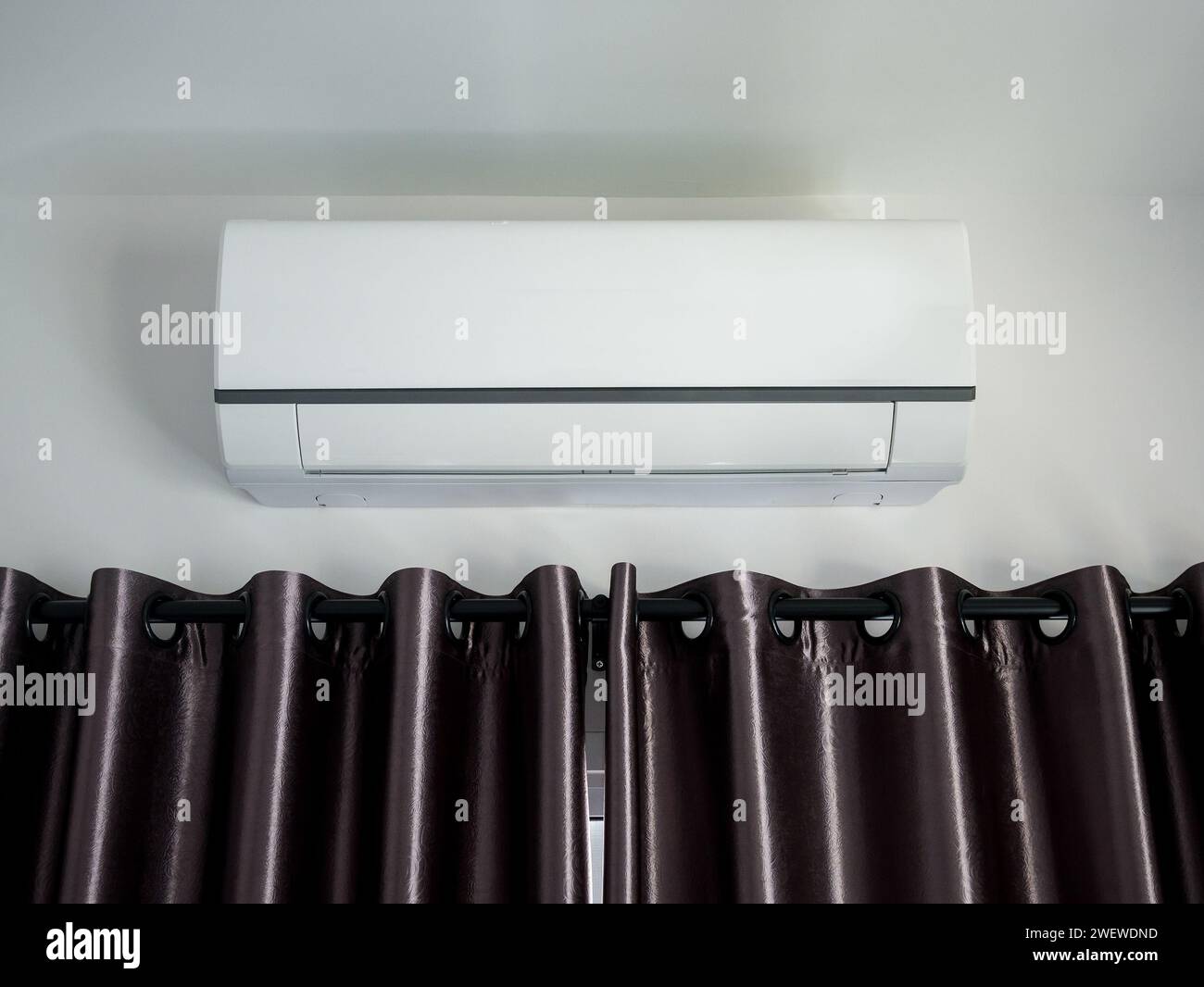 Air conditioner on wall in modern house room Stock Photo - Alamy