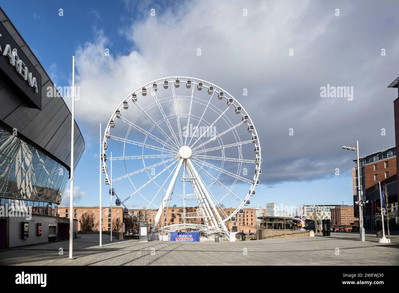 Liverpool, united kingdom January, 16, 2024  M and S Bank Arena and Wheel of Liverpool at King's Dock. Former Echo arena sponsored by Marks and Spence Stock Photo