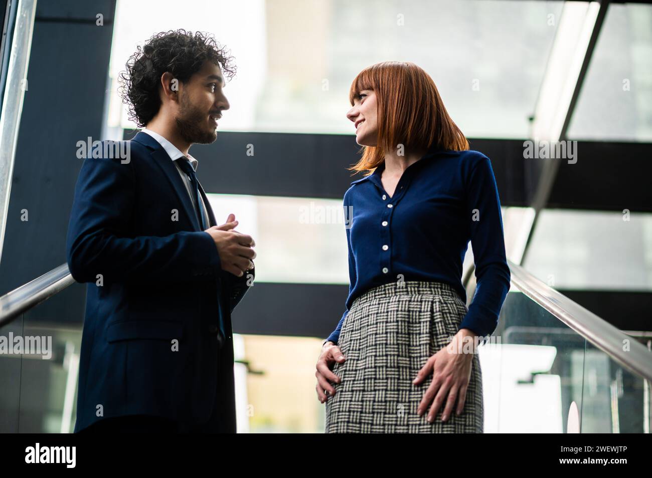 Business partners discussing together outdoor in a modern urban setting Stock Photo