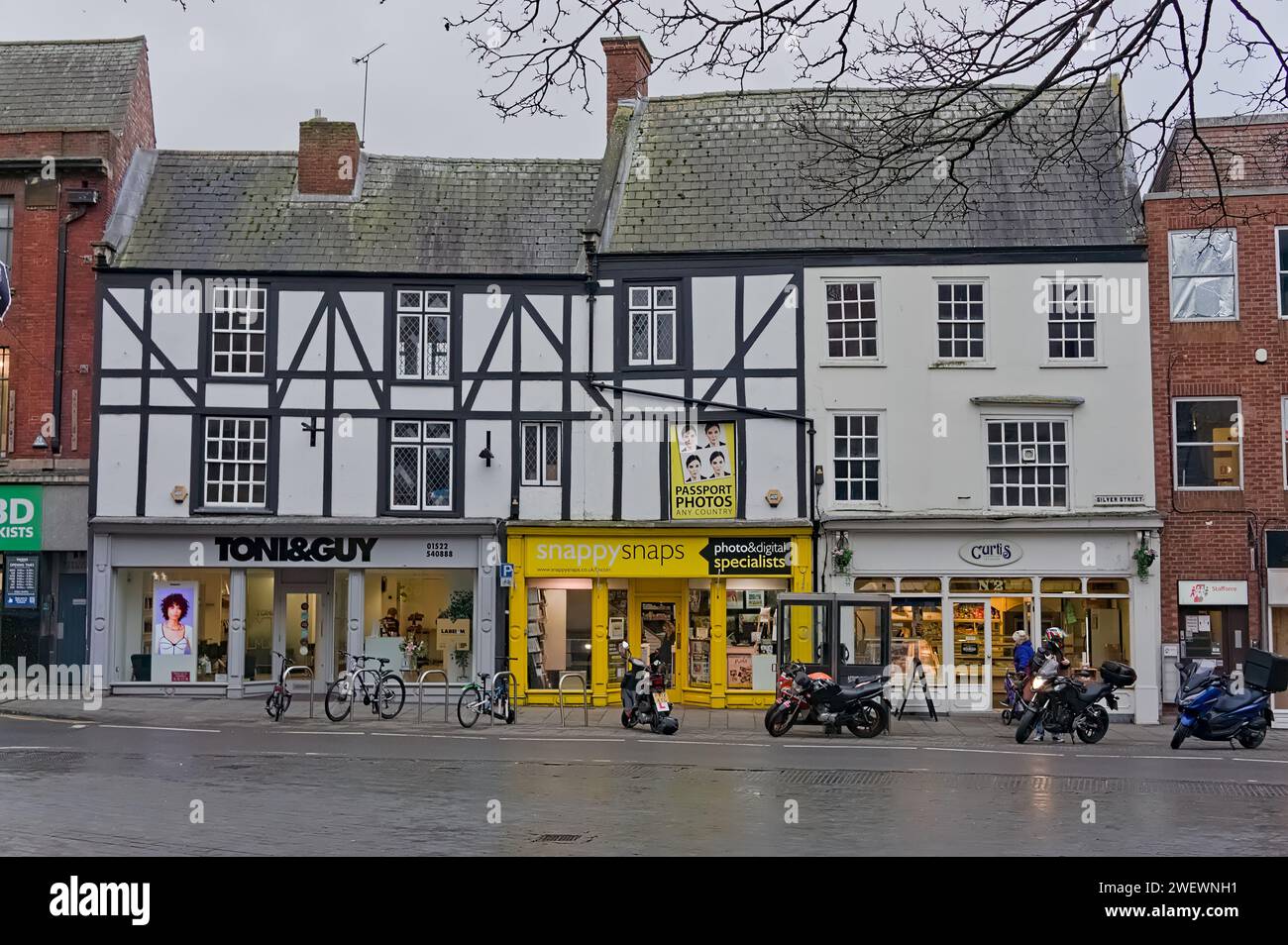 A row of shops along Silver Street in Lincoln Stock Photo