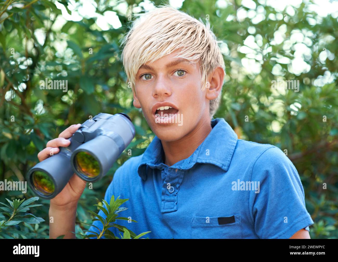Nature portrait, binocular and child surprise over discovery on