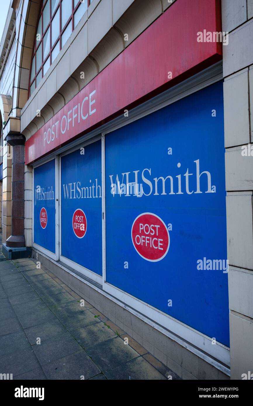 Shop Window of WHsmith in Redhill Surrey covered with the logo of the
