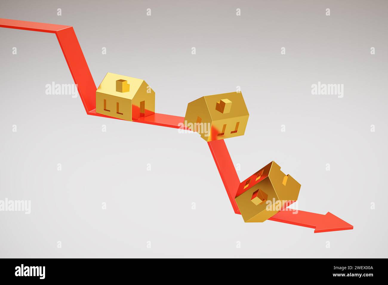 Falling real estate prices concept. several golden houses tumbling on a