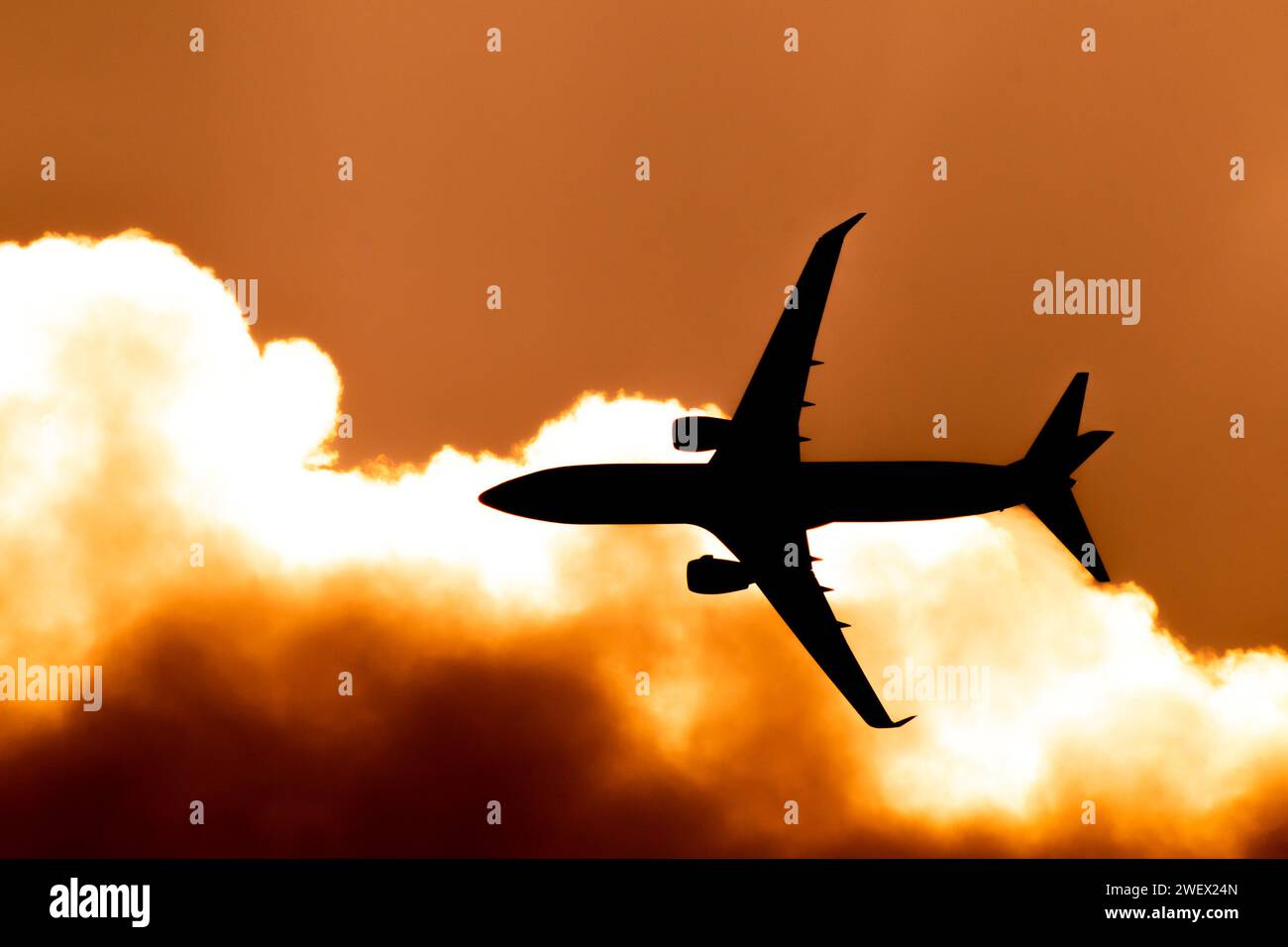 Aircraft Passenger take off shot at sunset time background Stock Photo ...