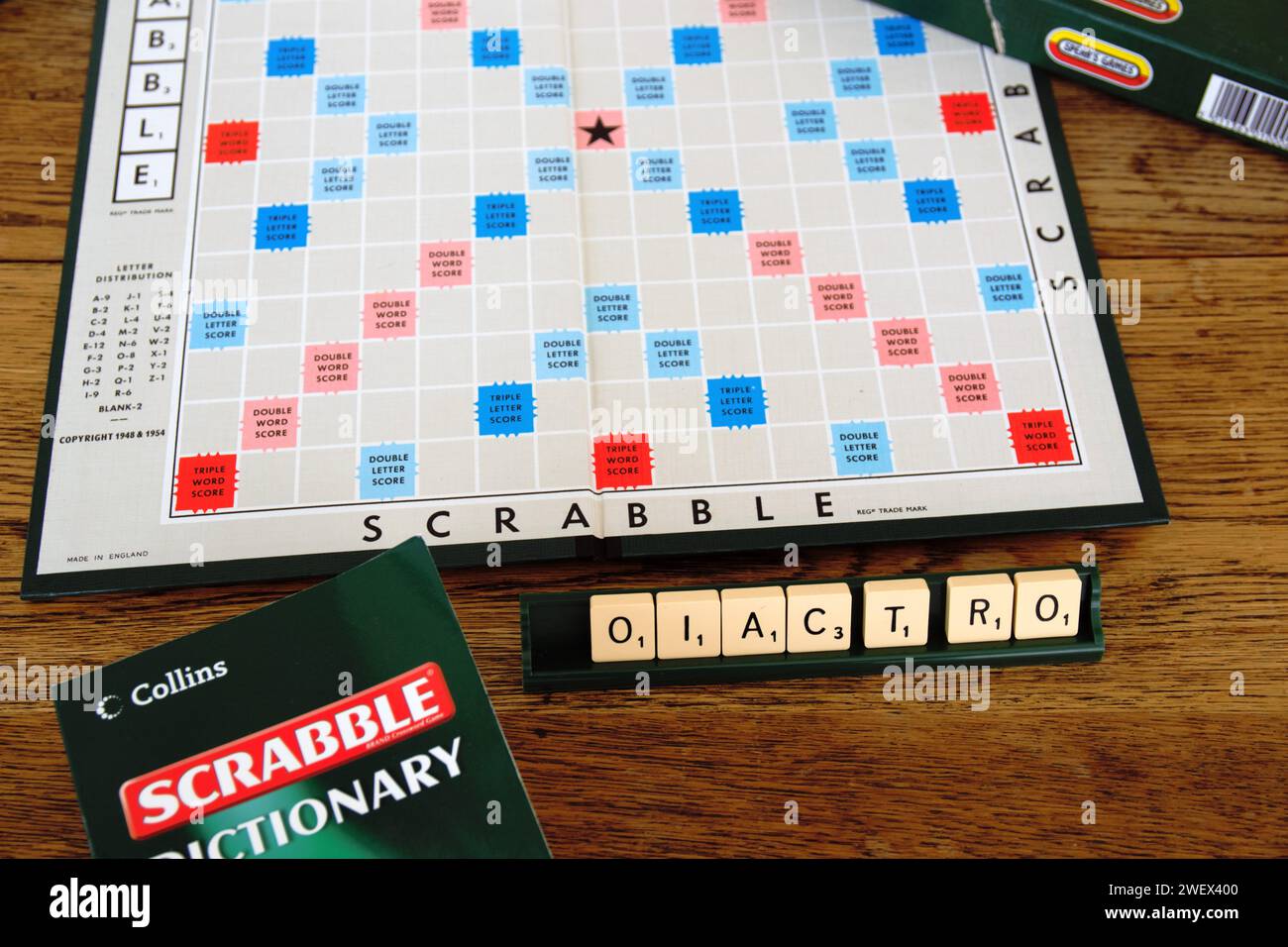 Scrabble board game. Spelling word play, making words out of tiles on