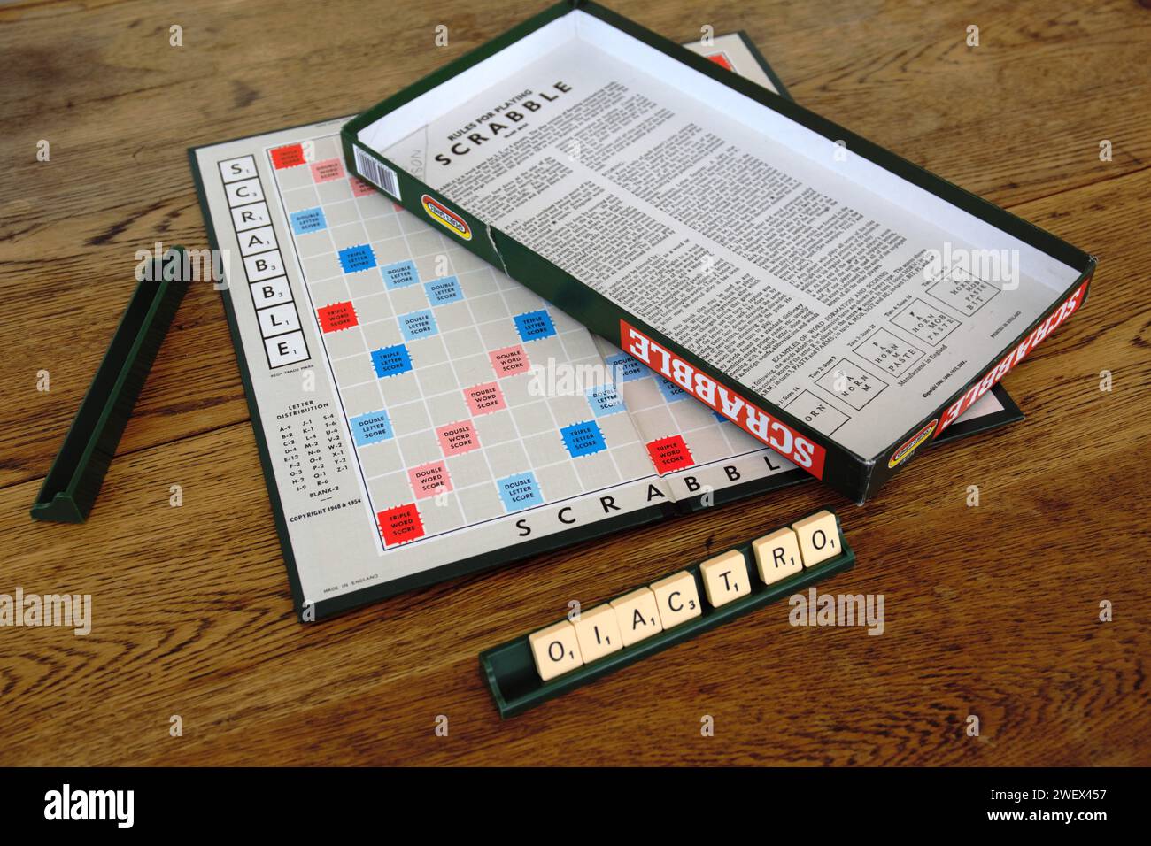 Scrabble board game. Spelling word play, making words out of tiles on ...