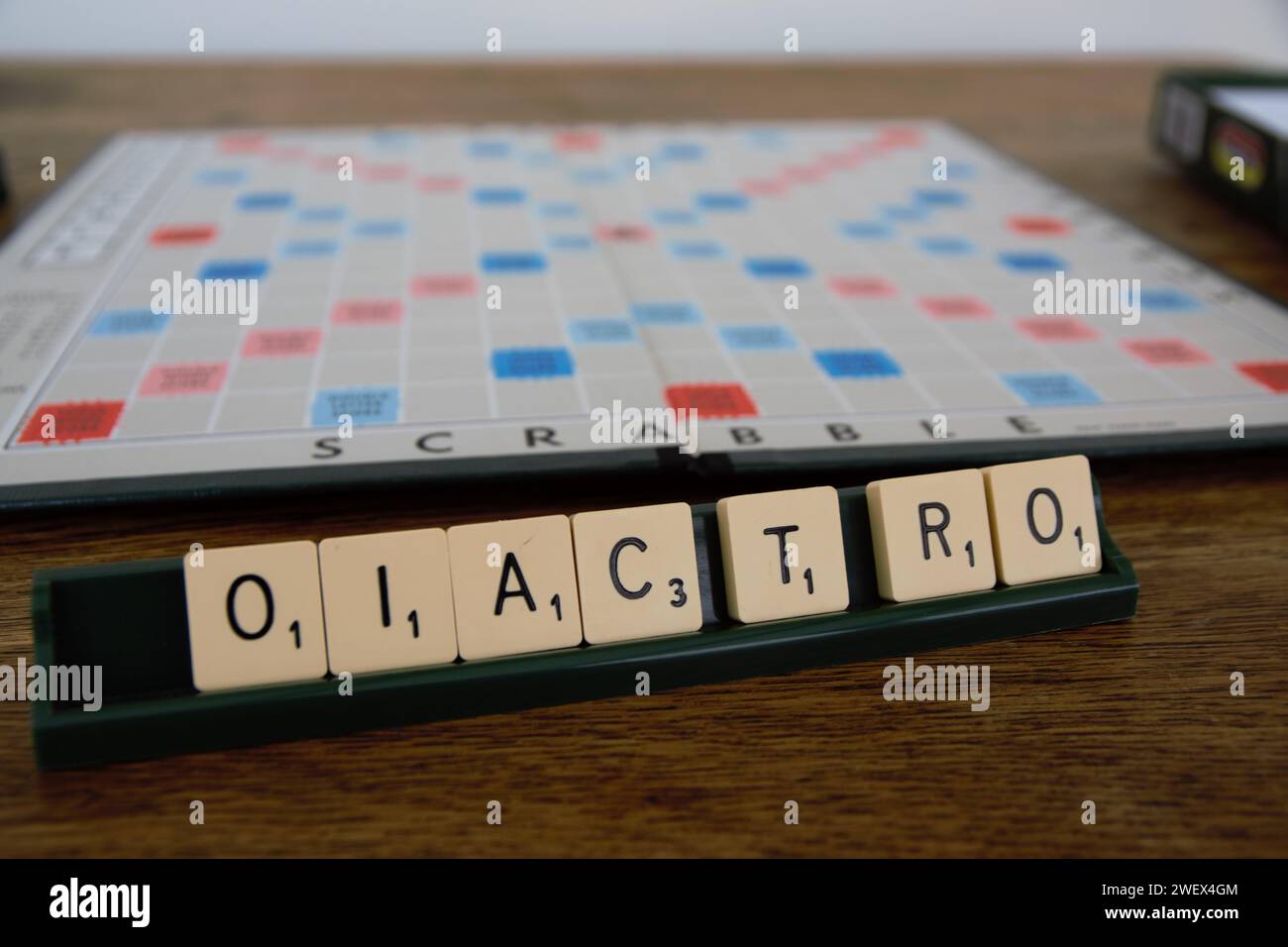 Scrabble board game. Spelling word play, making words out of tiles on ...