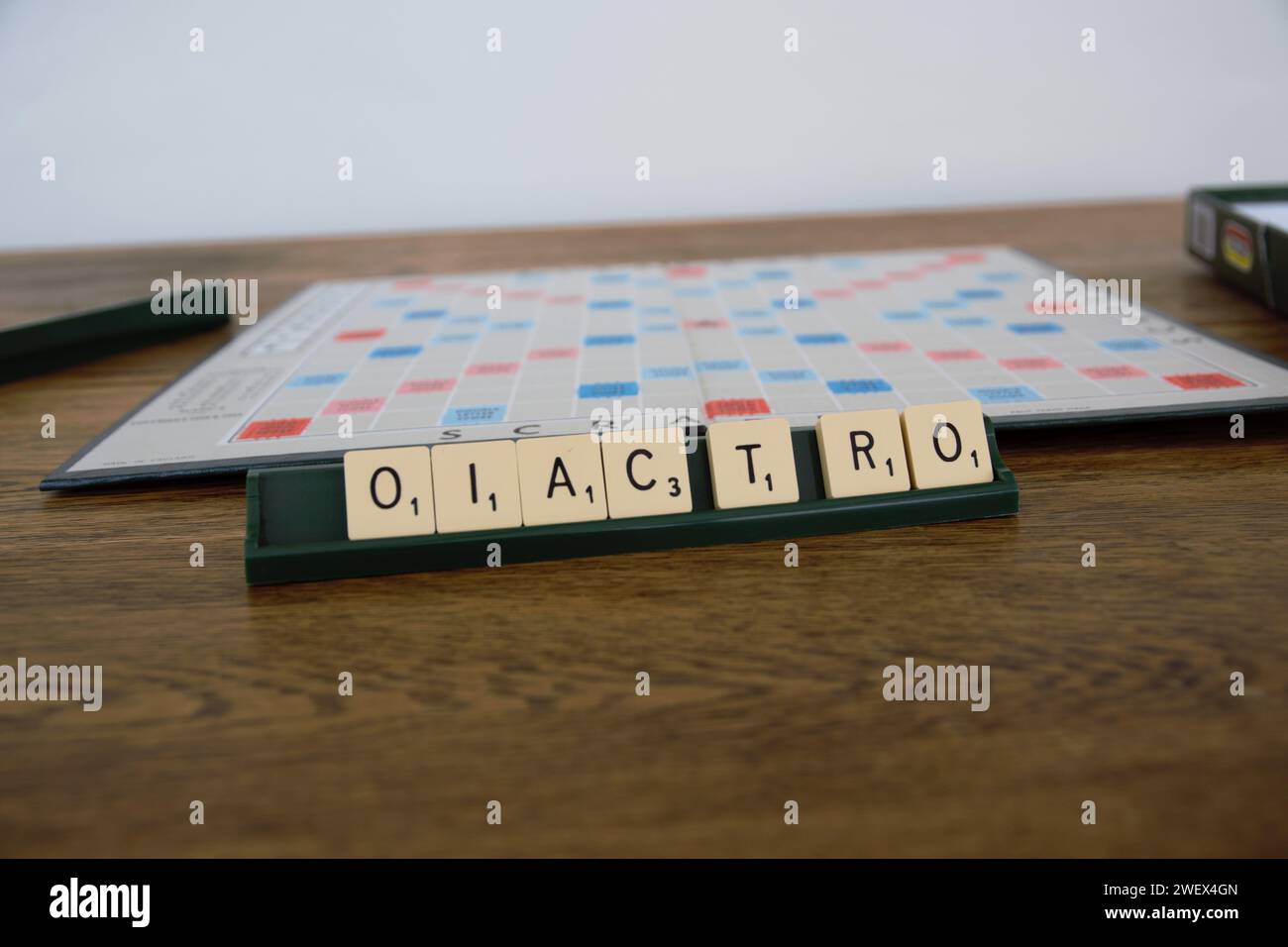 Scrabble board game. Spelling word play, making words out of tiles on