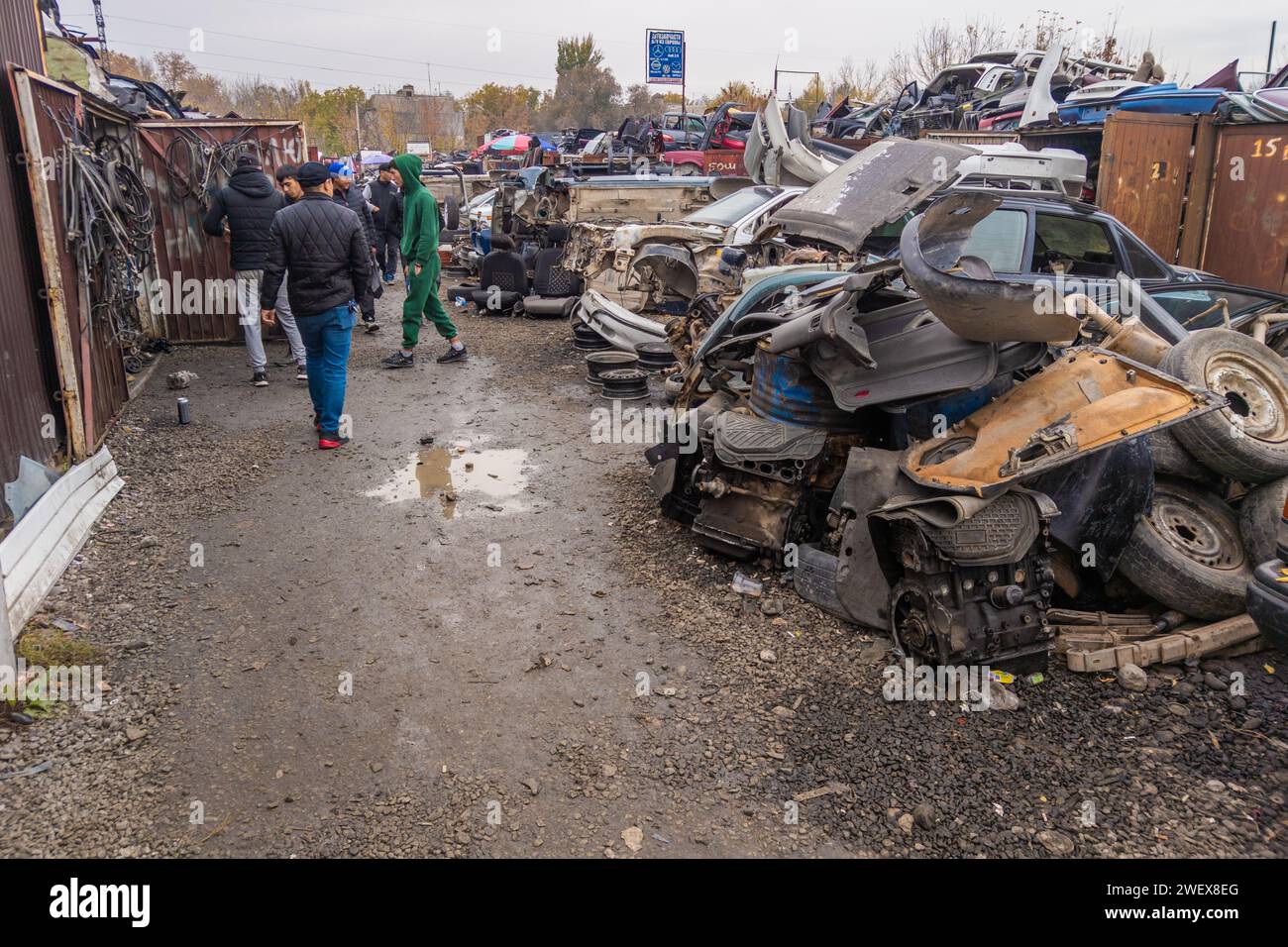 car parts at open air junkyard and used spare parts market in