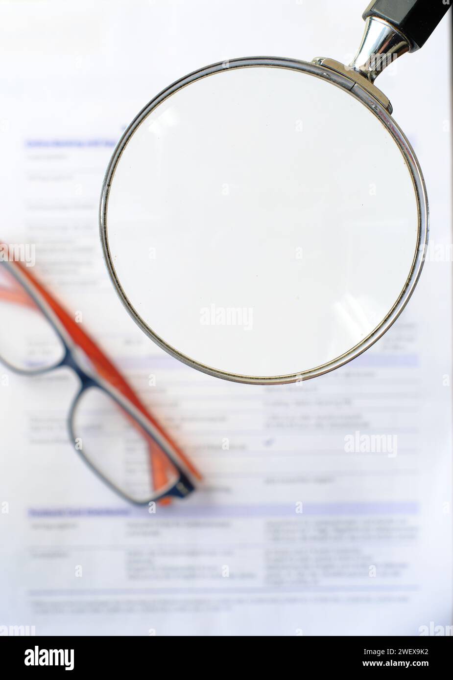 business papers, eyeglasses and magnifier with free copy space.Business contact,paperwork,meeting concept. Template or mockup with free copy and log s Stock Photo