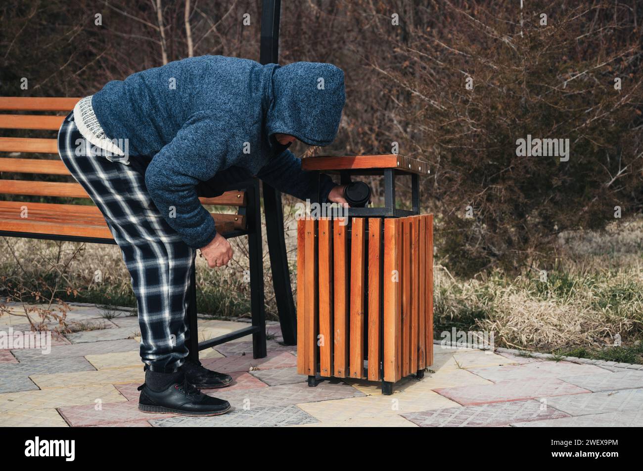 Rummaging Definition Poor man rummaging garbage in hi-res stock photography and images - Alamy
