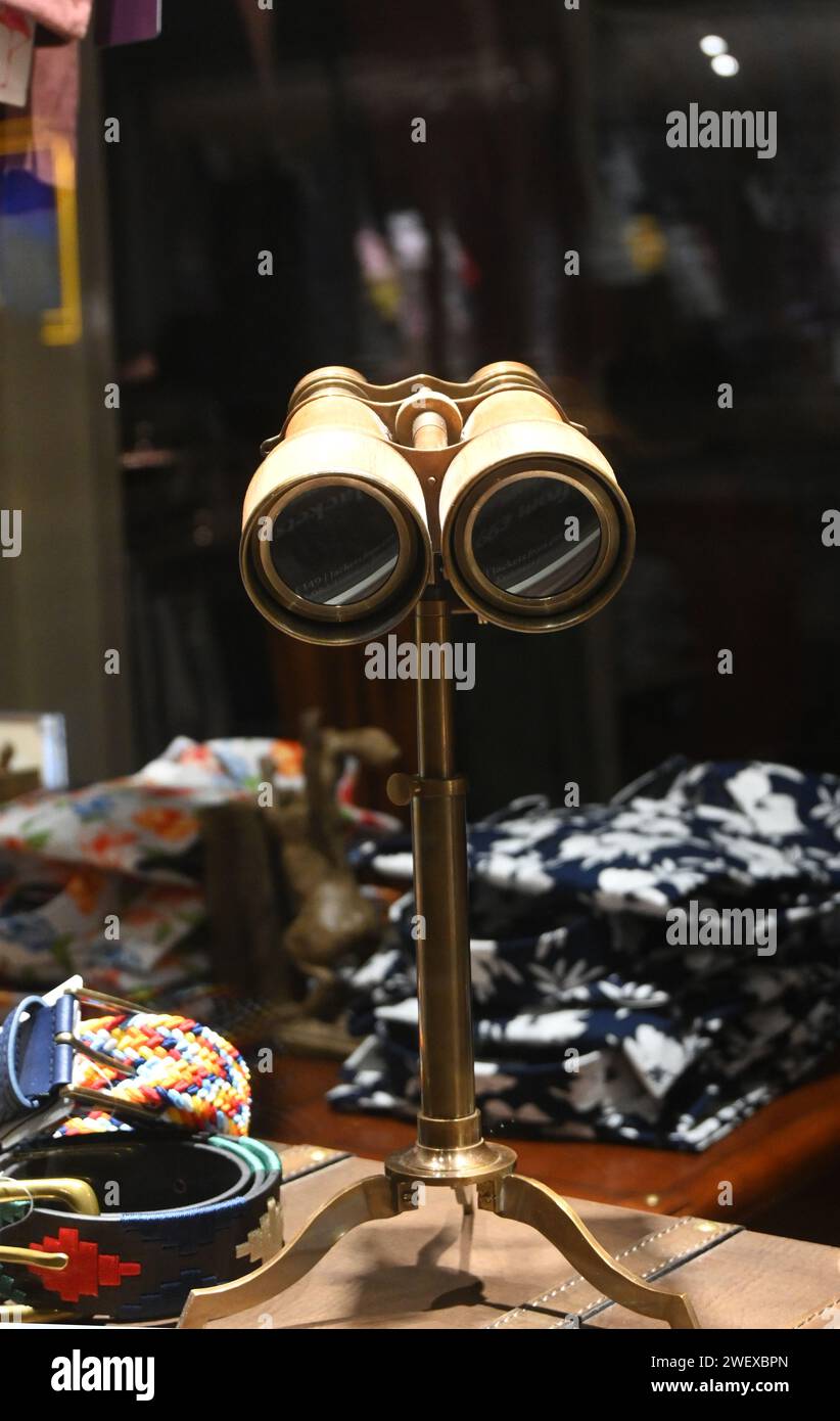 shop window with binoculars on stand Stock Photo Alamy
