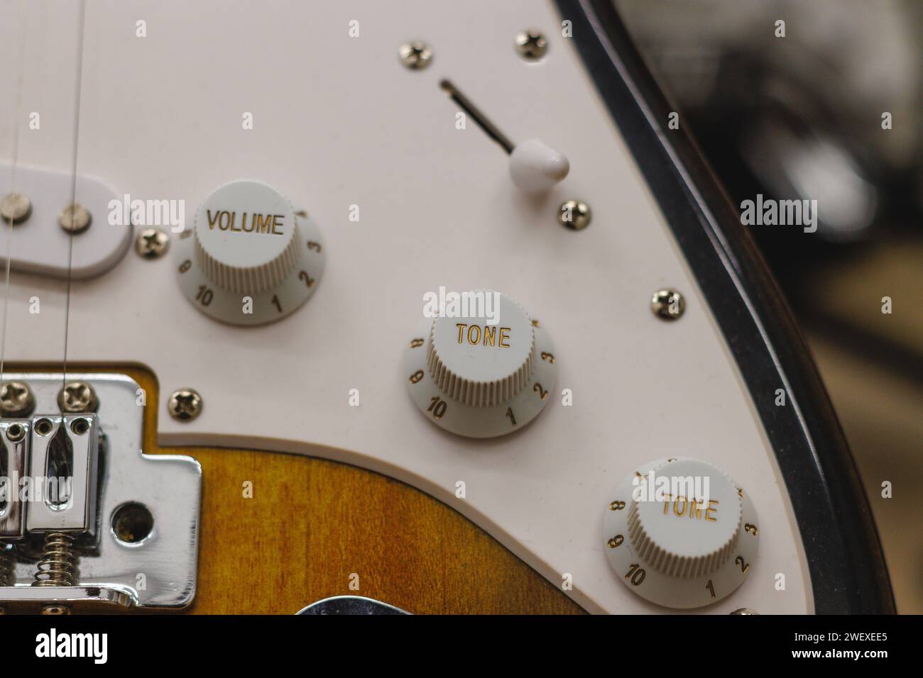 Details white electric guitar buttons Stock Photo Alamy