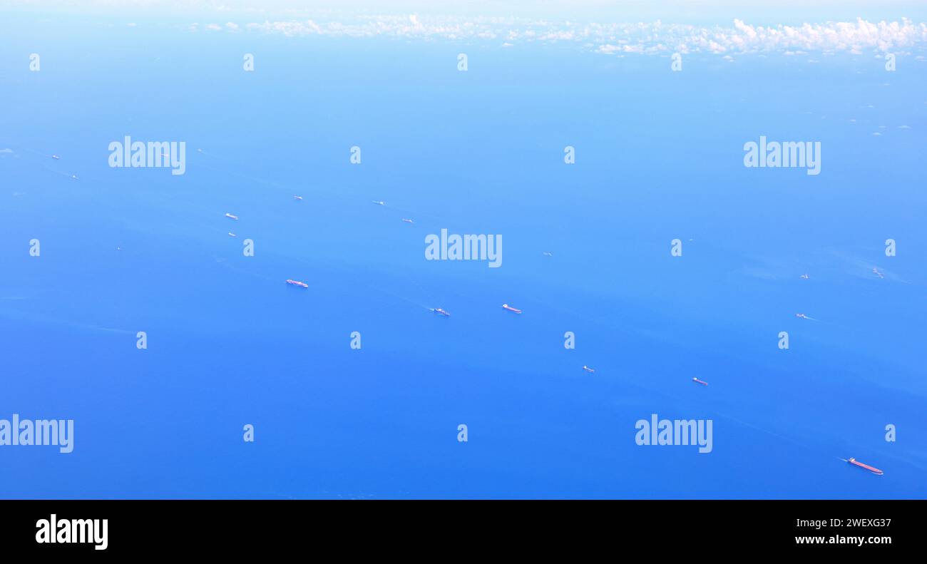 Aerial view of the Singapore Strait, Ocean liner, tanker and Cargo Ship in Singapore Strait, View from plane. Stock Photo