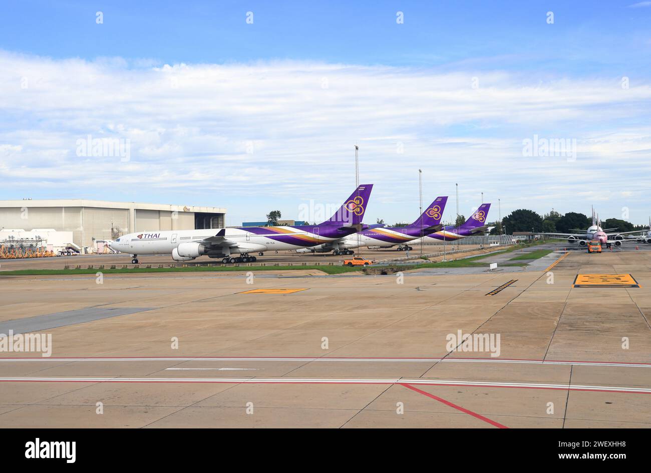 Abandoned airplanes in the parking lot close to the airport's maintenance and storage area at Don-Mueang International Airport. Stock Photo