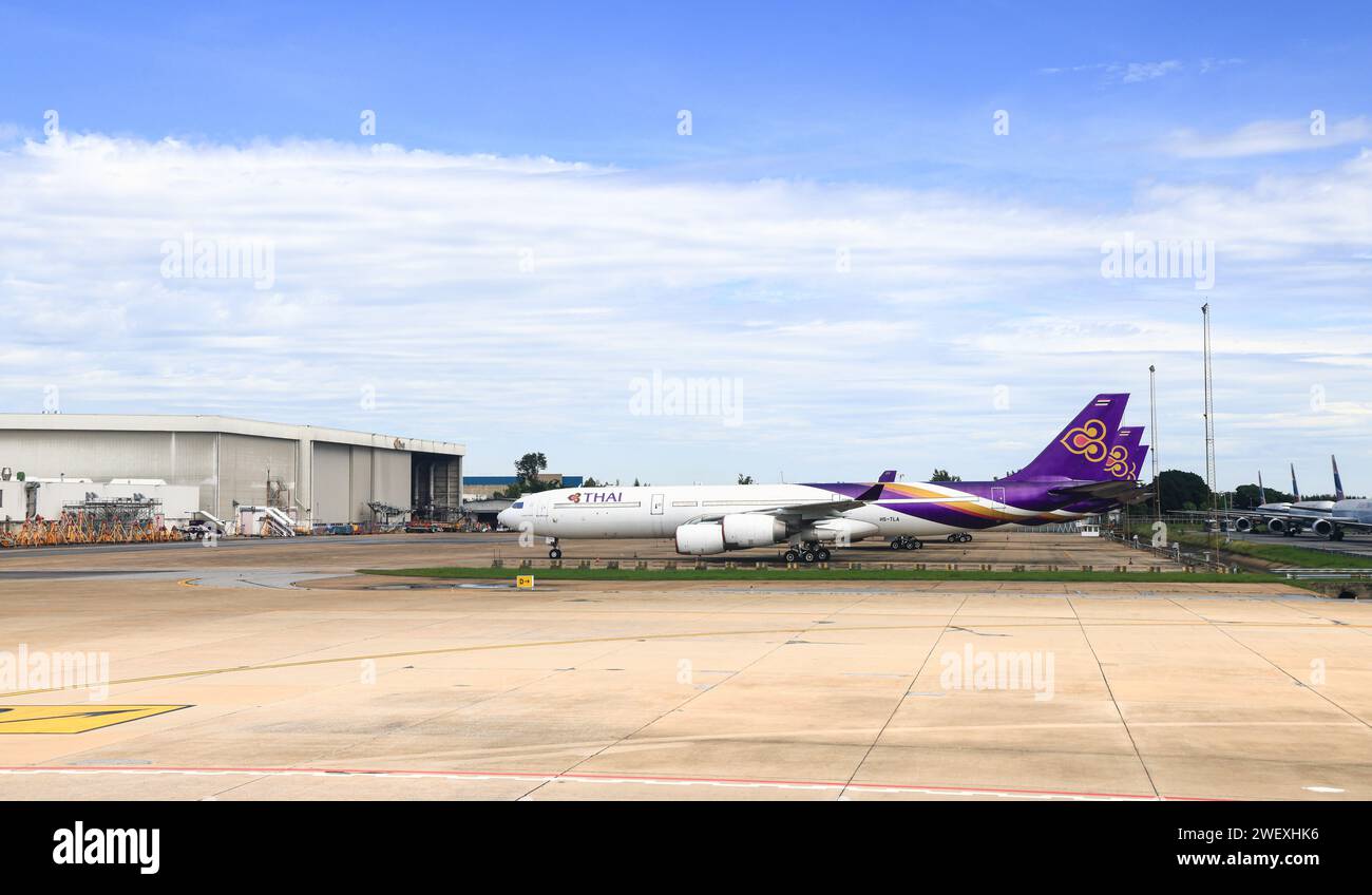 Abandoned airplanes in the parking lot close to the airport's maintenance and storage area at Don-Mueang International Airport. Stock Photo