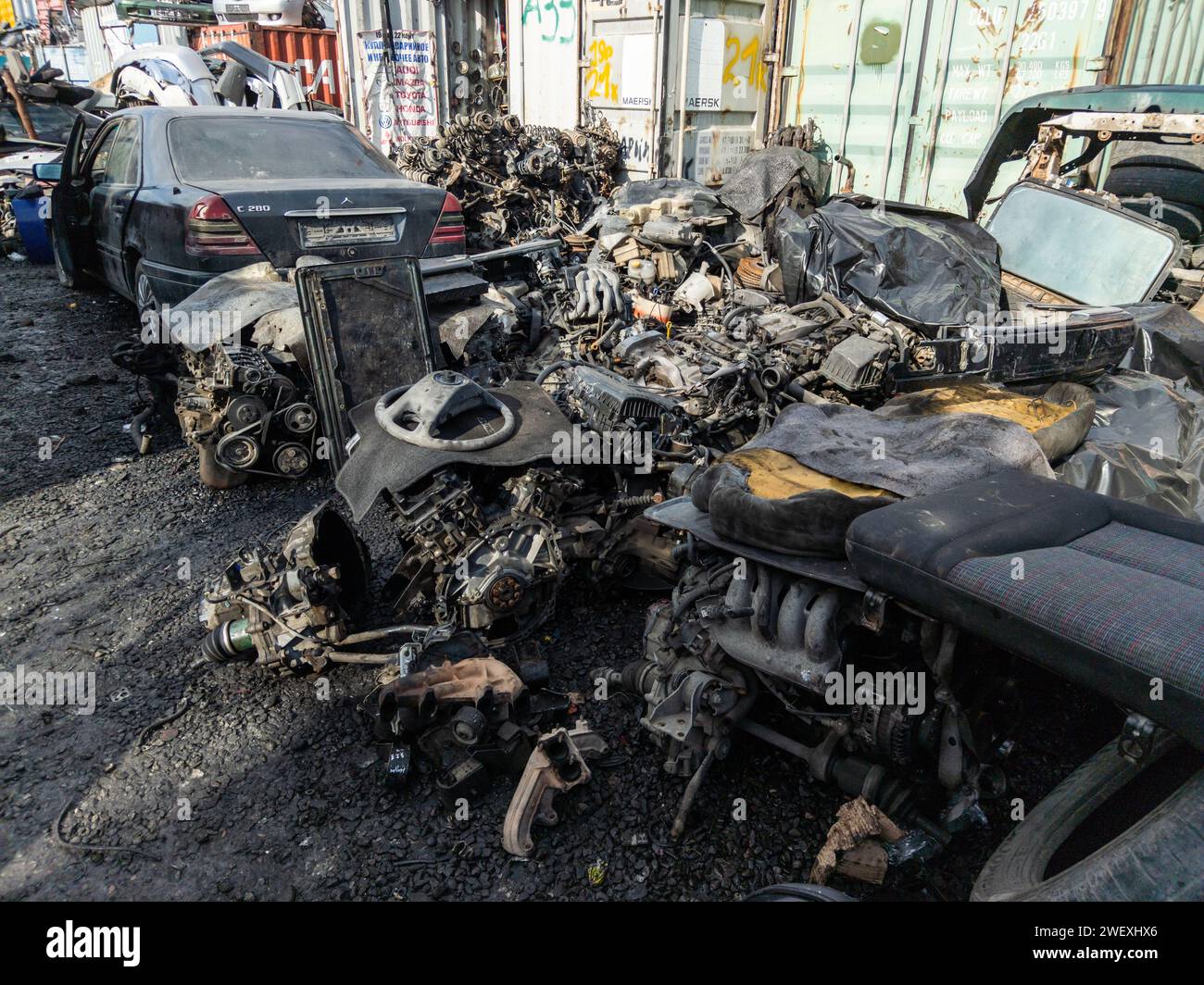car parts at open air junkyard and used spare parts market in
