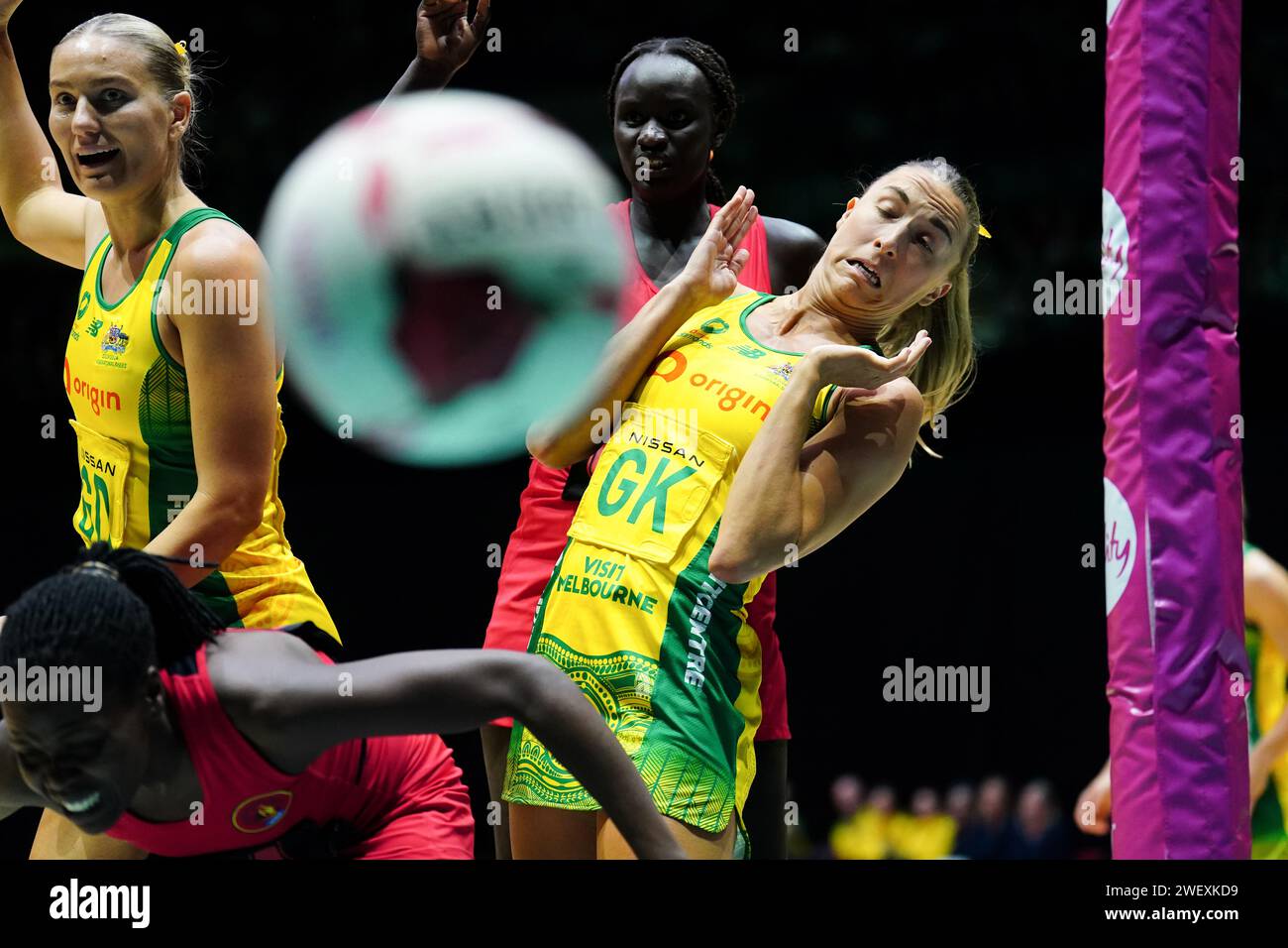 Australia's Courtney Bruce and Uganda's Christine Namulumba during the 2024 Vitality Netball