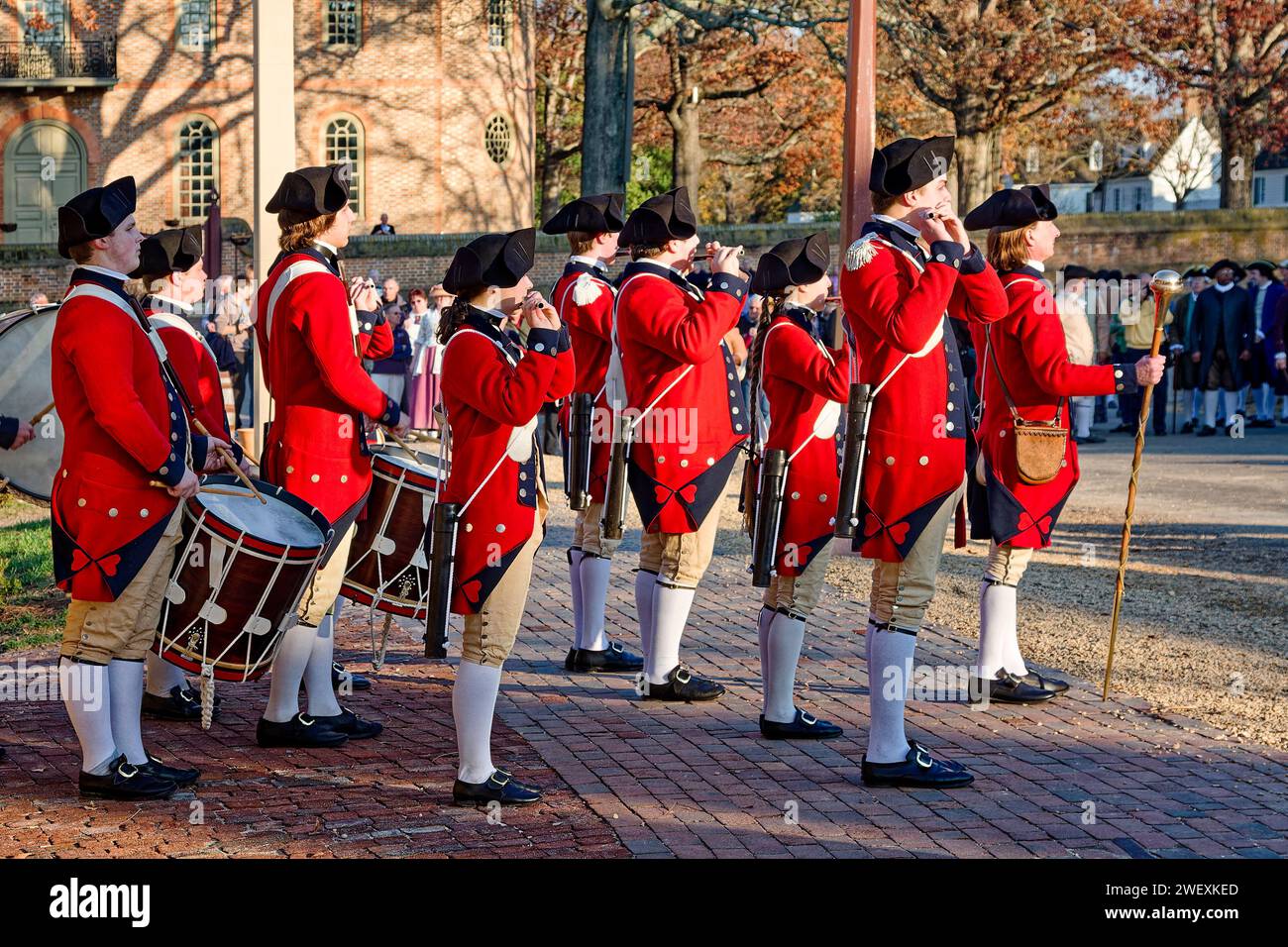 Fifes and Drums Regiment, standing outdoors, fifes playing, Director