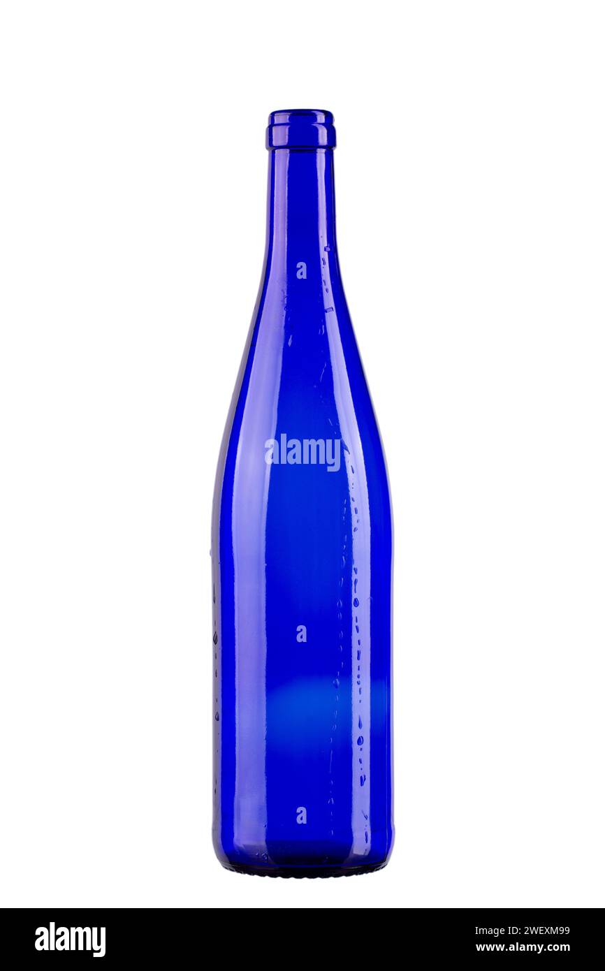 Empty blue wine bottle with water drops isolated on white background