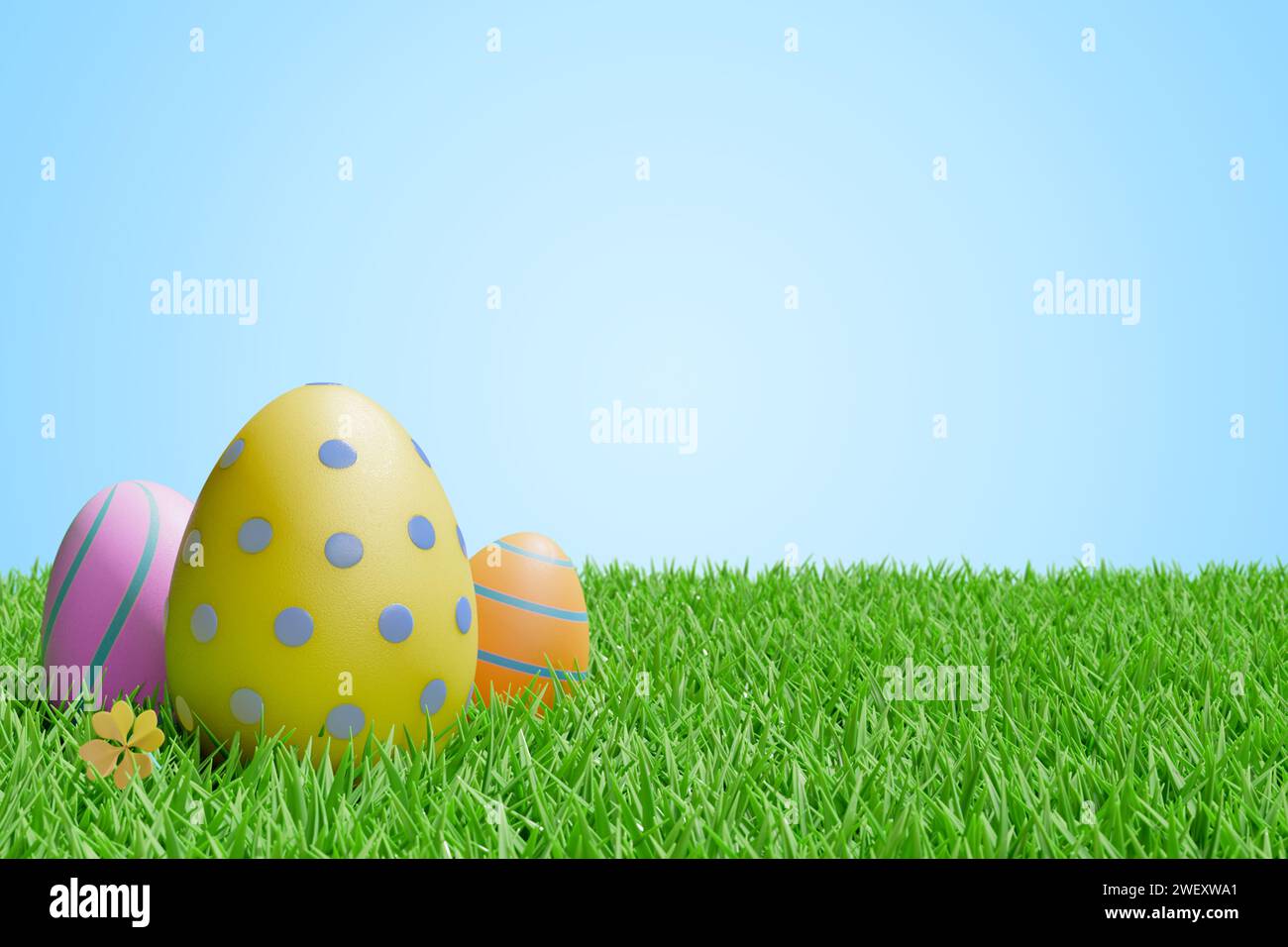 Easter eggs on a meadow in the grass. 3d rendering Stock Photo