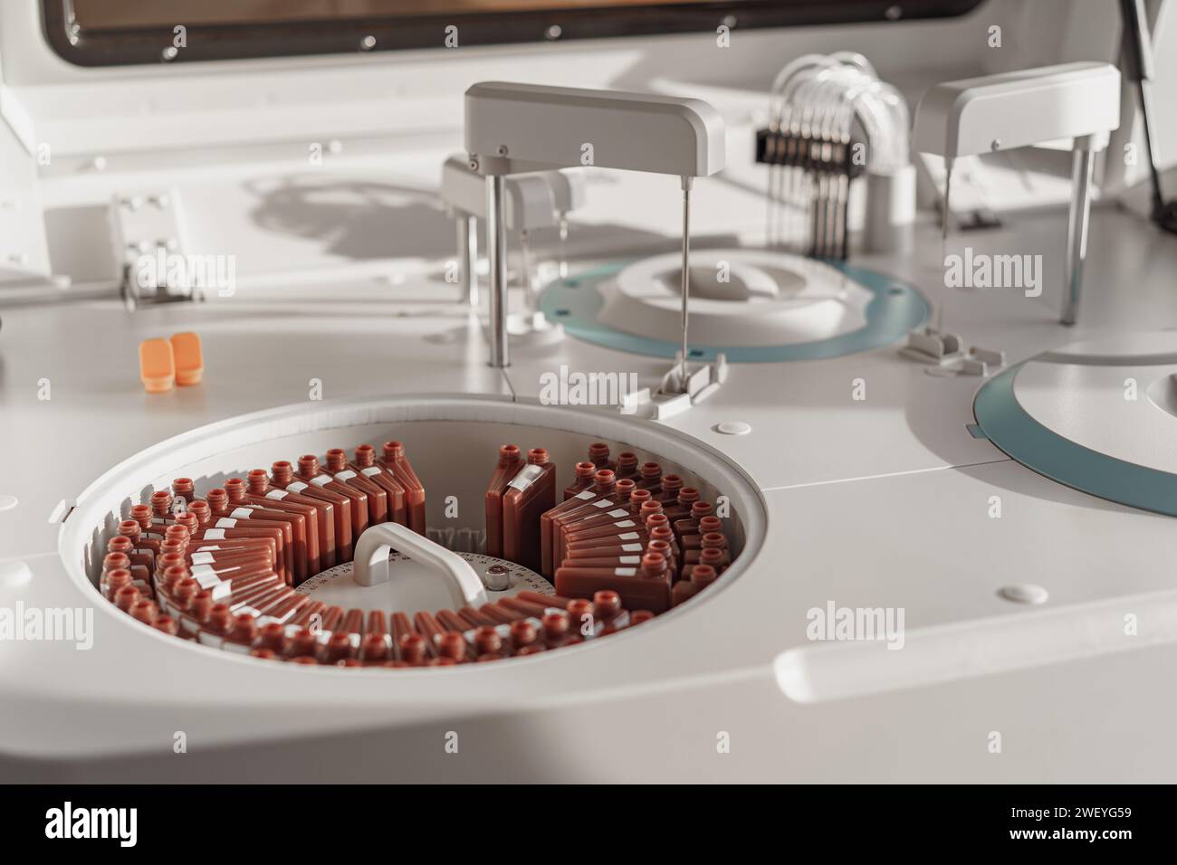 Microcentrifuge machine with test tubes standing in research laboratory
