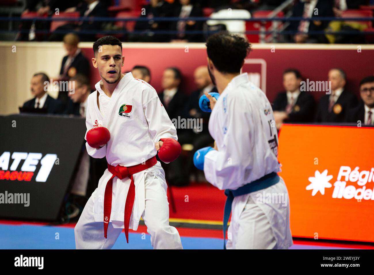 Paris, France. 26th Jan, 2024. Tiago Duarte (Red), from Portugal, and Ahmed Ezzat Mohy el Sharaby (Blue) from Italy compete during the Male Kumite 75kg category. The Paris Open Karaté 2024, organized by World Karaté Federation and French Karaté Federation, takes place from 26th to 28th January at the Pierre de Coubertin Stadium, in Paris. The first day of the competition had the Round Robin of Kumite and Kata Individual in the, categories of Male 75kg, 60kg and 84kg and Female 61kg and 50kg. (Photo by Telmo Pinto/SOPA Images/Sipa USA) Credit: Sipa USA/Alamy Live News Stock Photo