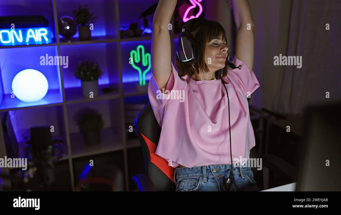 Cheerful, confident hispanic streamer, beautiful young woman dancing ...