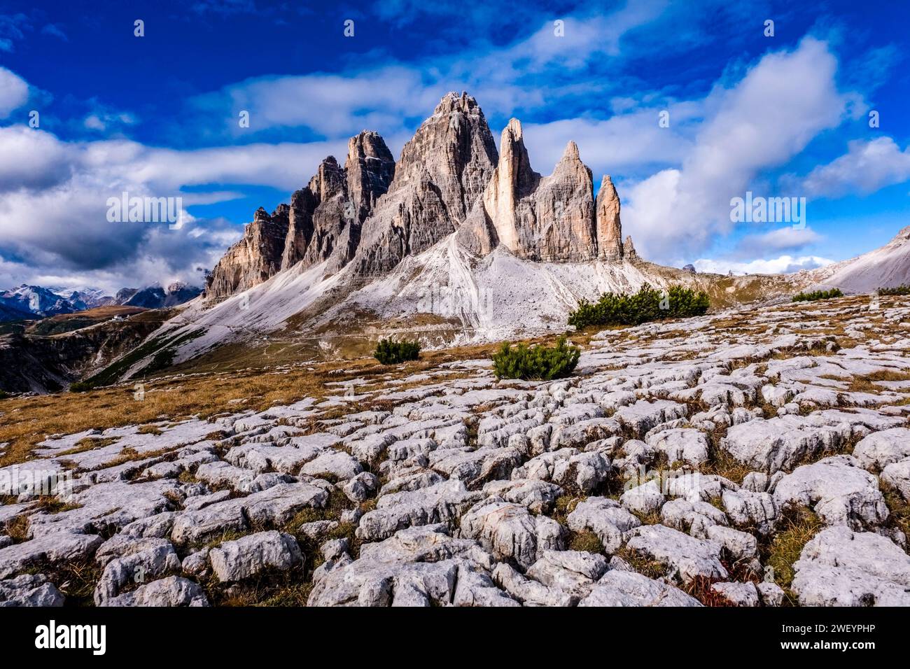 The rock formation Tre Cime di Lavaredo, seen from the summit of Quota 2387 in Tre Cime National Park in autumn. Cortina d Ampezzo Veneto Italy FB 202 Stock Photo