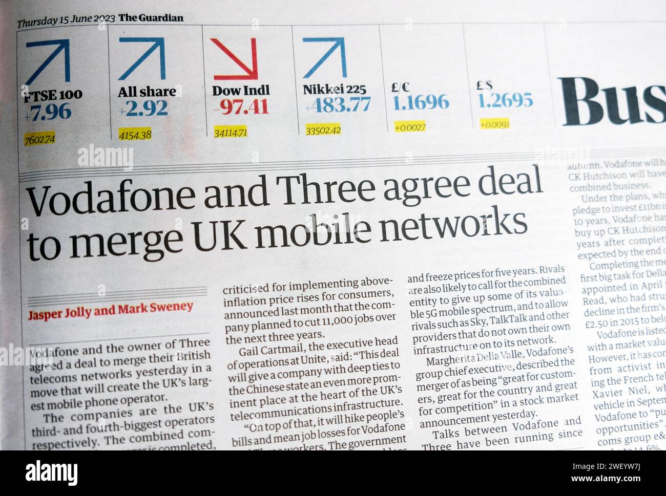 'Vodafone and Three agree deal to merge UK mobile networks' Guardian newspaper headline business article 15 June 2023 London England UK 15 June 2023 Stock Photo
