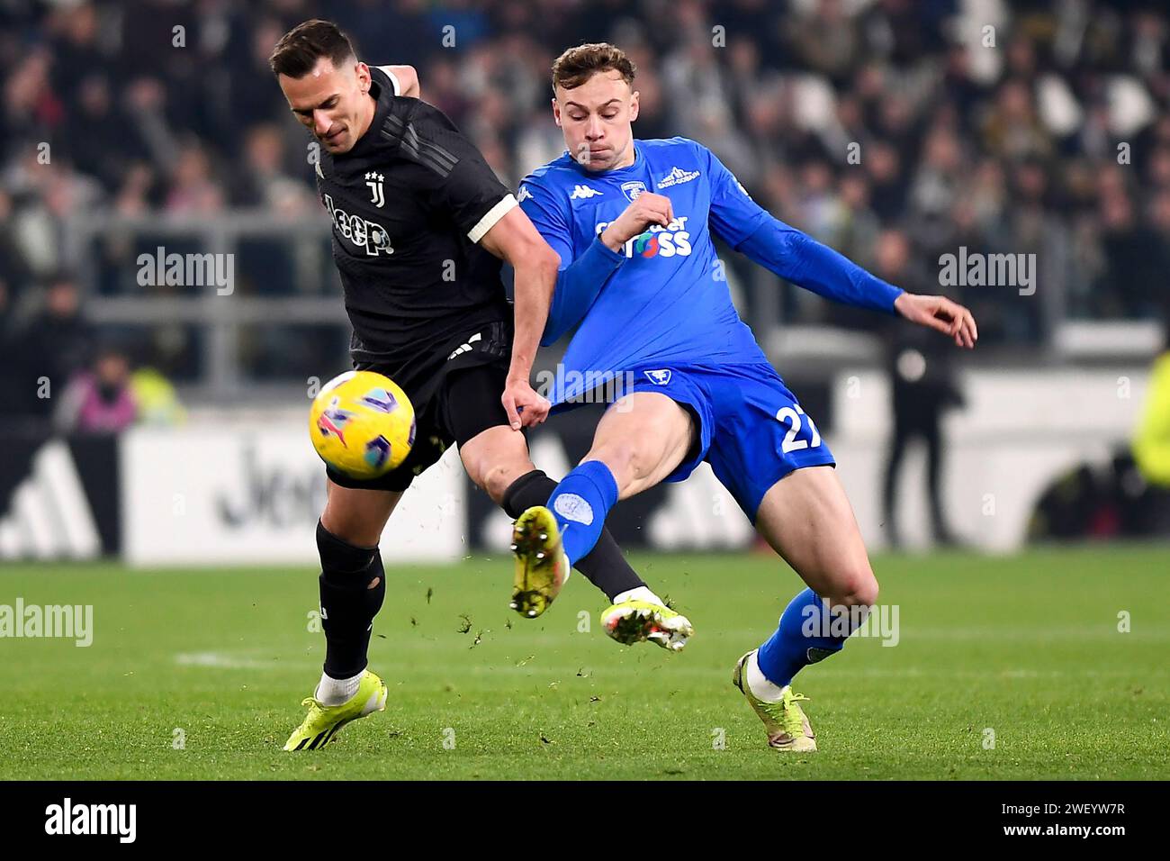Turin, Italy. 27th Jan, 2024. Arkadiusz Milik of Juventus FC and Szymon Zurkowski of Empoli FC compete for the ball during the Serie A football match between Juventus FC and Empoli FC at the Juventus Stadium in Turin (Italy), January 27, 2024. Credit: Insidefoto di andrea staccioli/Alamy Live News Stock Photo